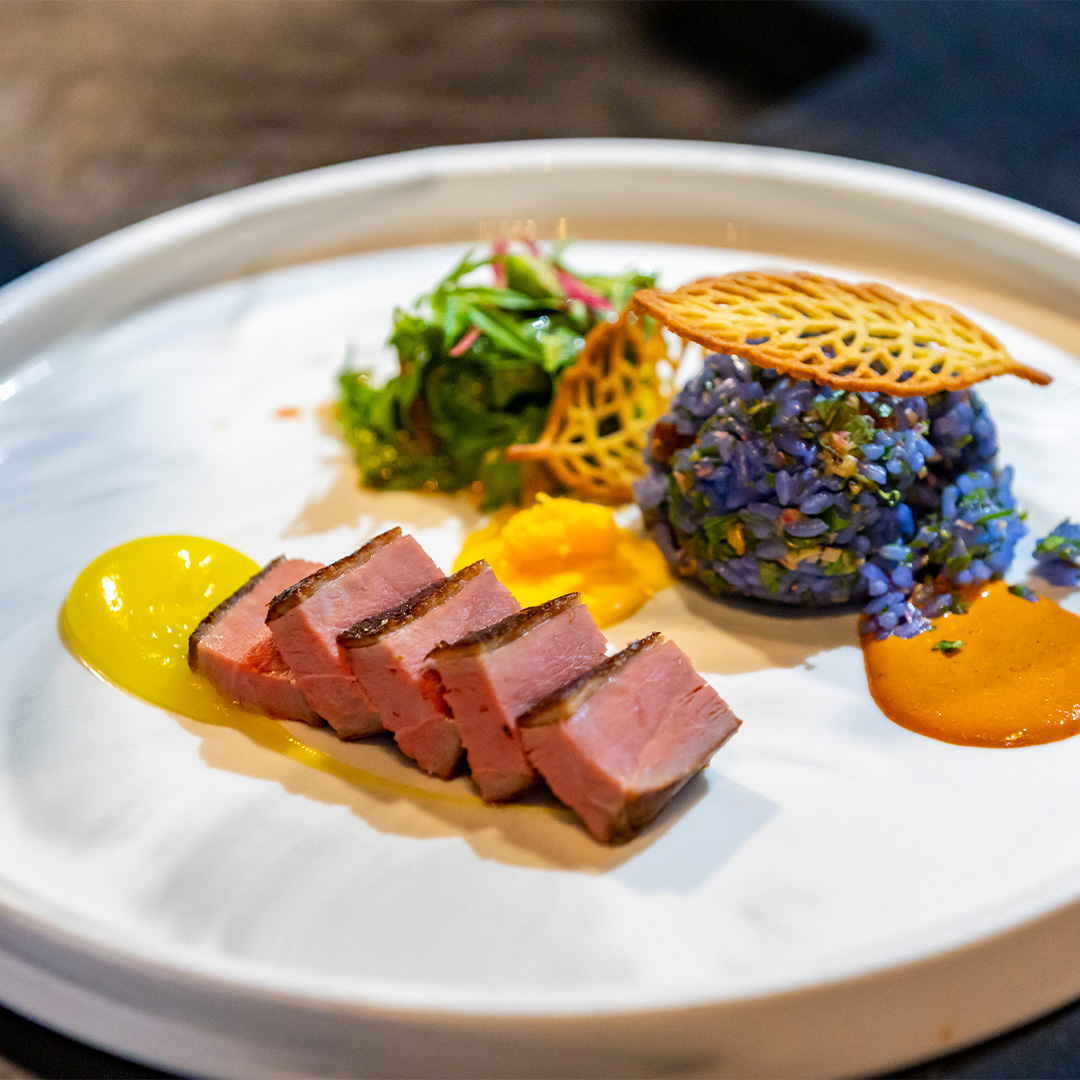 GCC2025 3rd Place: Sugarcane Smoked Bidor Duck Breast With Nasi Kerabu Duck Liver Onigiri and Budu Lime Vinaigrette Ulam